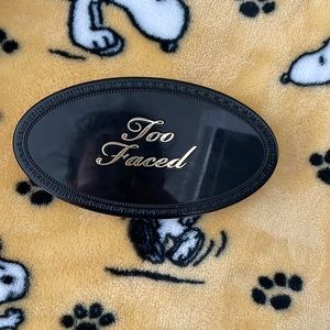 Too Faced highlighter trio palette